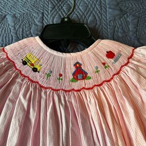 Pink Smocked Dress with Embroidered Details